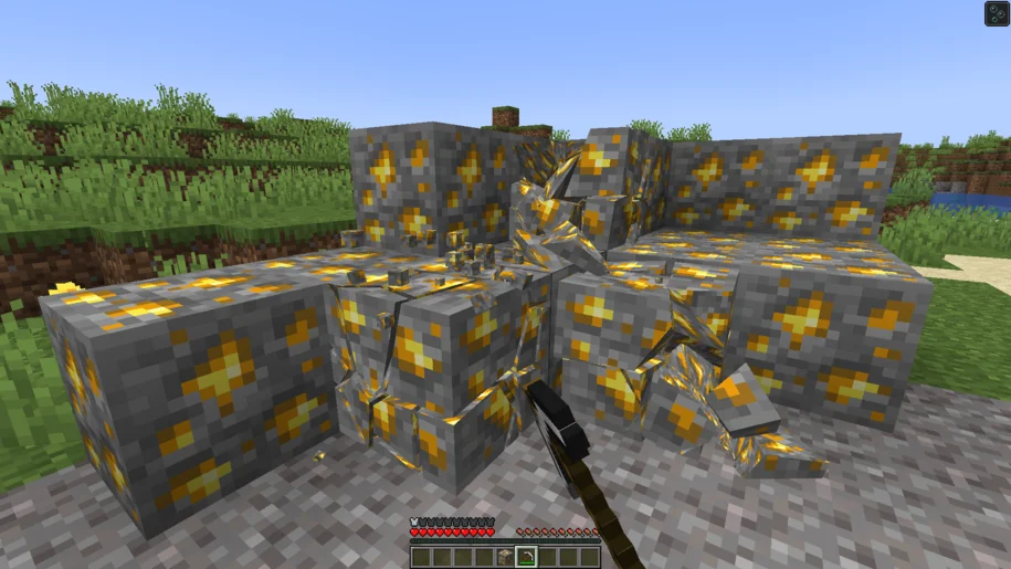 Minecraft Physics Mod in action with gold ore