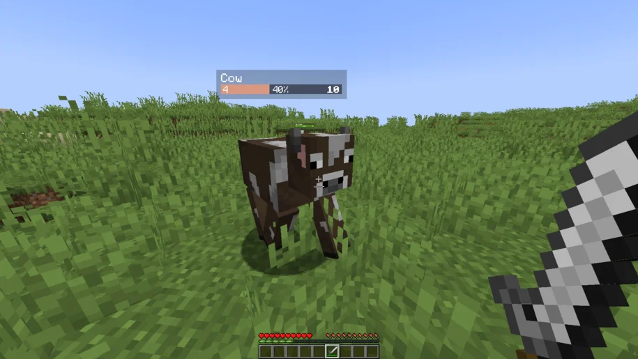 A health bar on a cow from the Neat mod